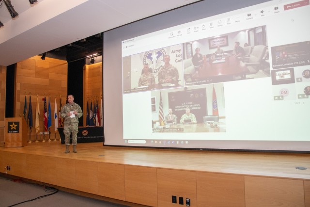 Soldier on stage giving presentation